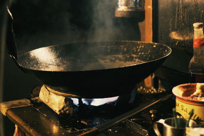Close-up of wok on stove