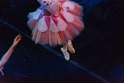 Low section of ballerina performing on stage