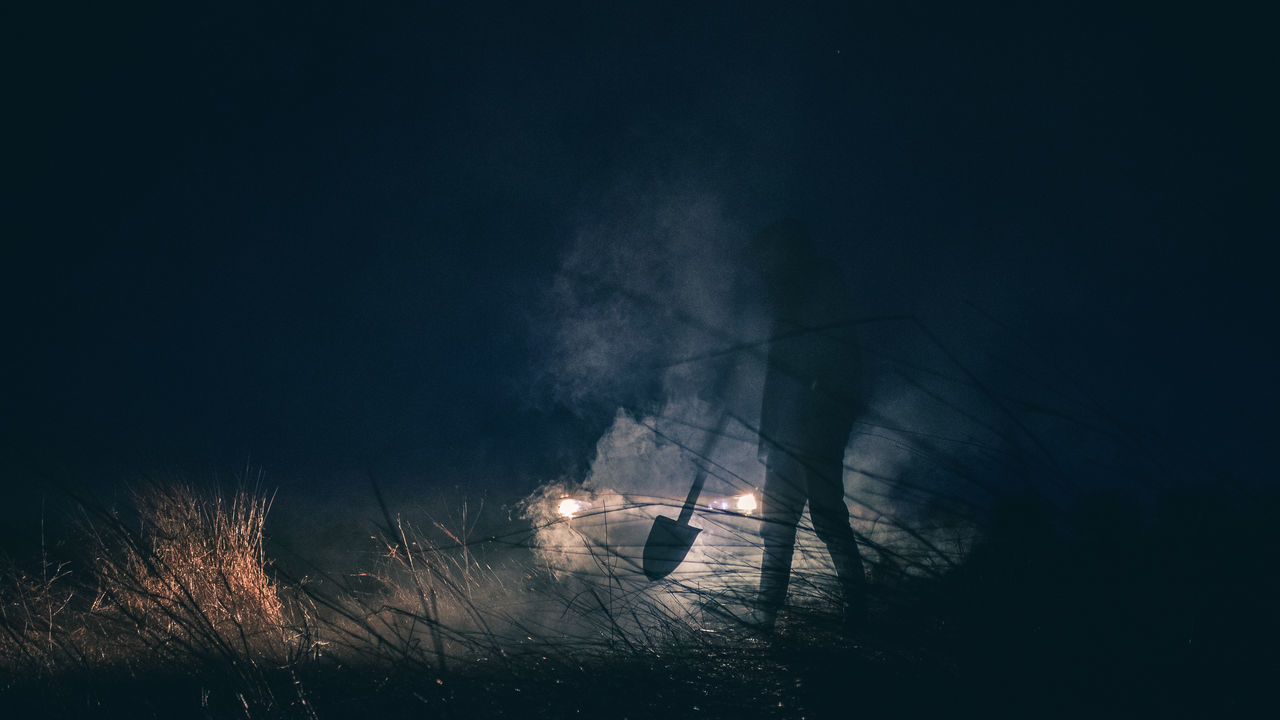 SILHOUETTE OF PEOPLE WITH FIRE CRACKERS