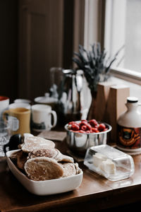 Food in container on table at home