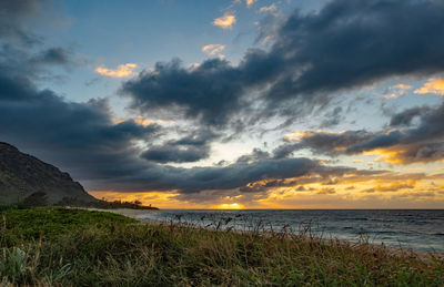 Scenic view of sea against sky during sunset