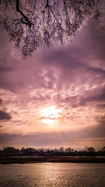 Scenic view of sunset over lake