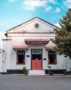 Facade of building against sky