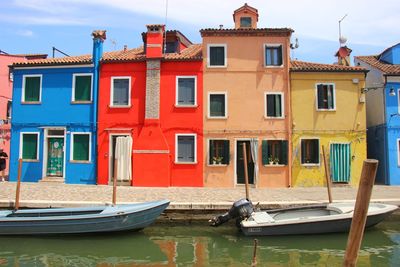 Boats moored at harbor