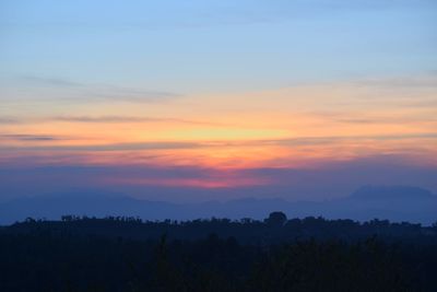 Scenic view of dramatic sky during sunset