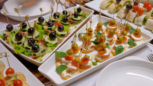 High angle view of fruits in plate on table