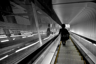 High angle view of person on escalator