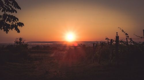 Scenic view of silhouette landscape against sky during sunset