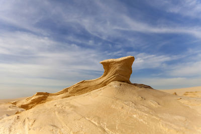 Scenic view of desert against sky