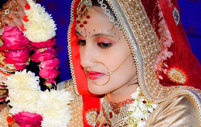 Close-up of beautiful bride looking away in wedding ceremony