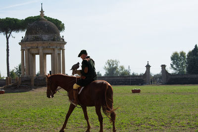 Man riding horse