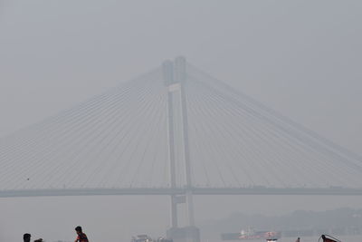 View of suspension bridge against sky