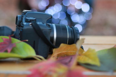 Close-up of camera on table
