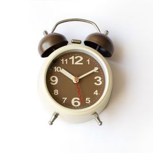 Close-up of clock on white background