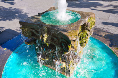 High angle view of fountain in swimming pool