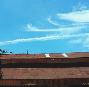 Low angle view of roof against sky