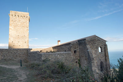 Low angle view of fort against sky