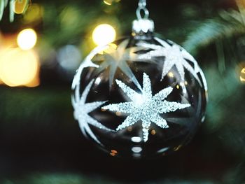 Close-up of illuminated christmas tree at night