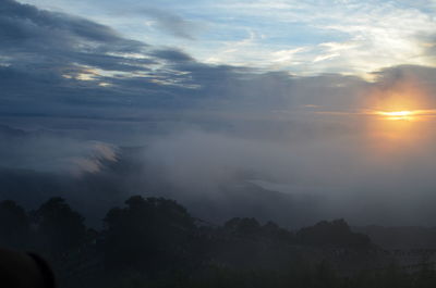 Scenic view of mountains against sky during sunset