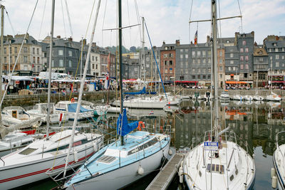 Panoramic view of boats moored at harbor