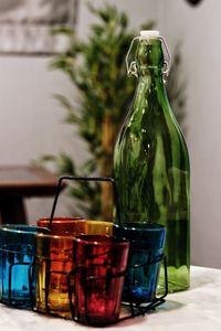 Close-up of wine bottles on table