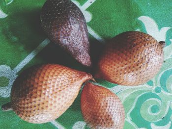 High angle view of fruits in basket on table