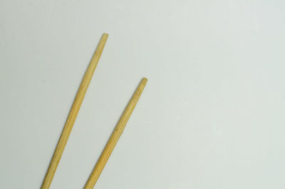 High angle view of pencils on white background