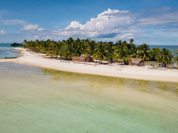 Scenic view of beach against sky