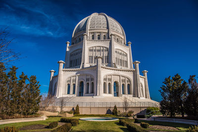 Low angle view of church against blue sky