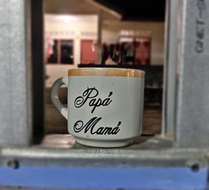 Close-up of coffee cup on table