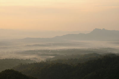 Scenic view of landscape against sky during sunset