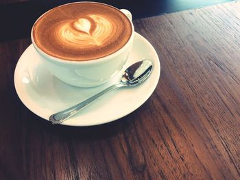 High angle view of cappuccino on table
