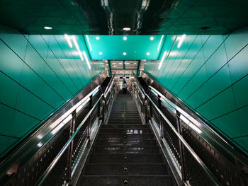 Low angle view of escalator in subway