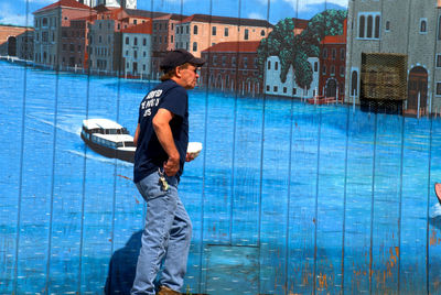Woman standing in front of sea
