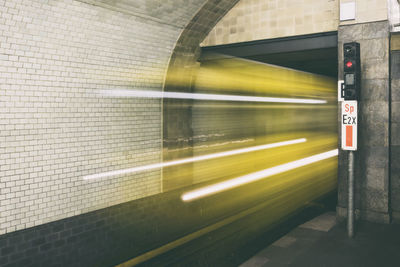 Blurred motion of train in subway station