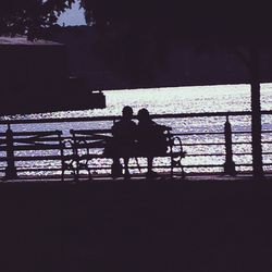 Silhouette of woman in dark background