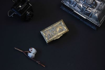 High angle view of toys on table against black background