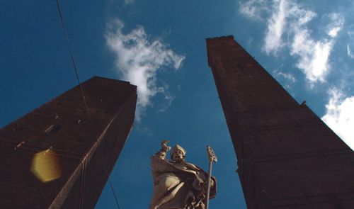 Low angle view of built structure against blue sky