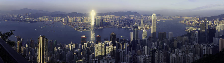 Panoramic view of city buildings against sky