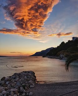 Scenic view of sea against sky during sunset