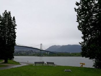 Bridge over river against sky