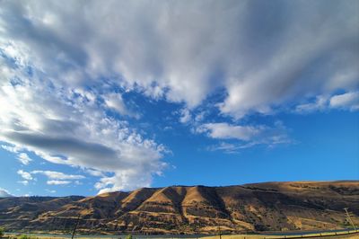 Scenic view of rocky mountains against sky