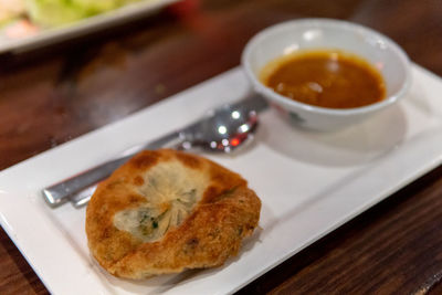 Close-up of breakfast served on table