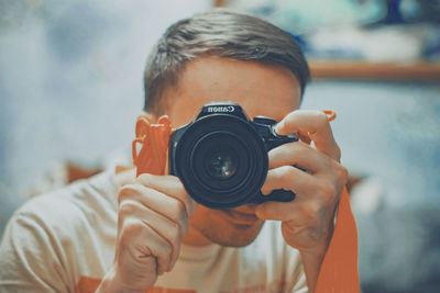 Portrait of man photographing