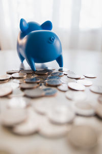 Close-up of coins on table