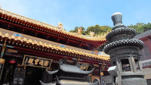 Low angle view of temple building against sky