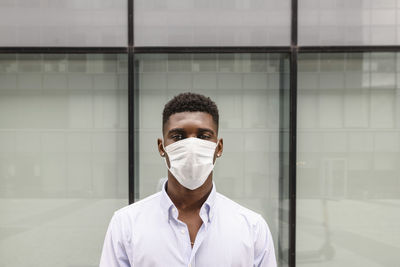 Young man wearing protective face mask