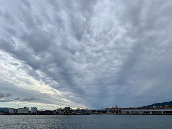 City by sea against sky