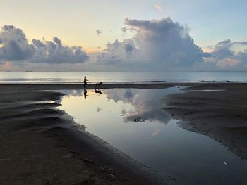 Scenic view of sea against sky at sunset