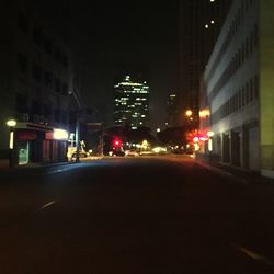 Illuminated street lights at night